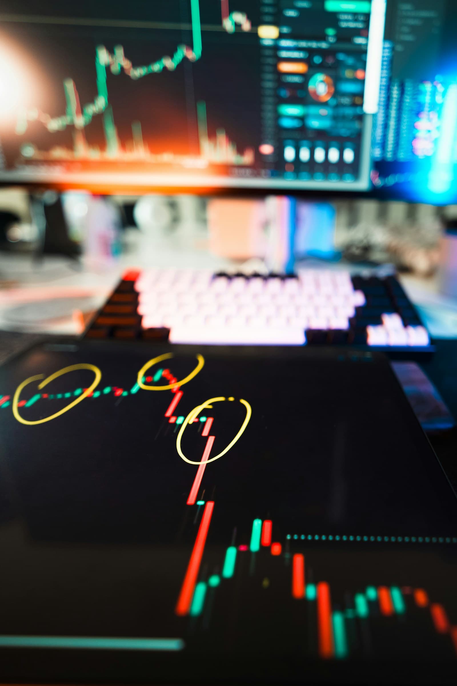 Financial forecast charts displayed across digital screens